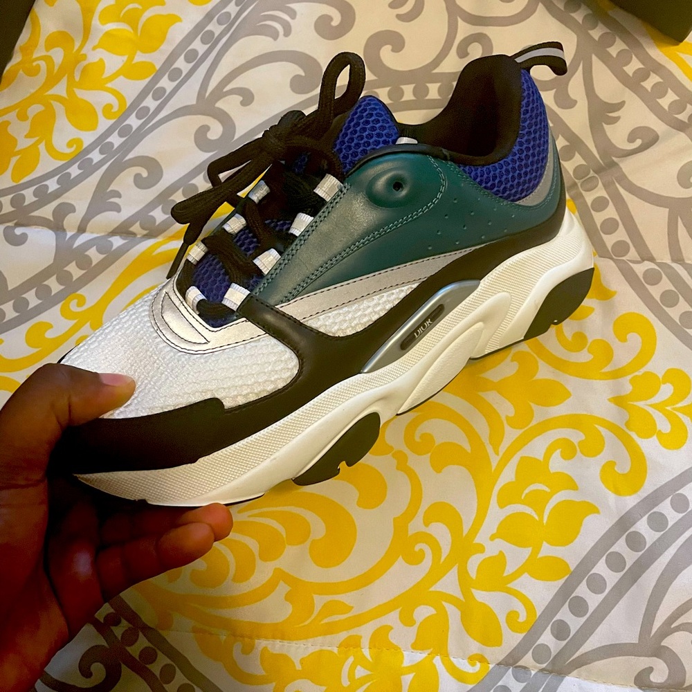 This is a black and white original dior sneakers, which is 11 in size